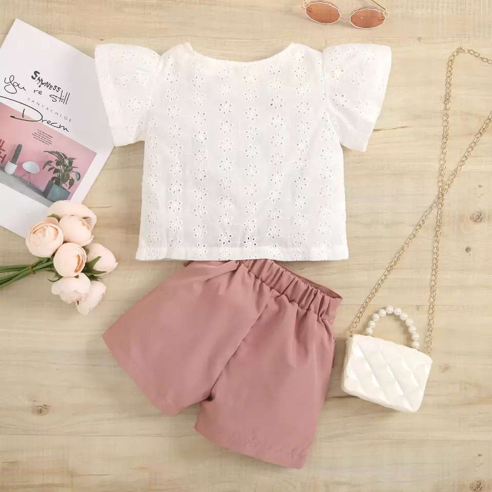 Conjunto niña dos piezas blusa + Falda short Rosada
