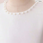 Vestido blanco con perlas