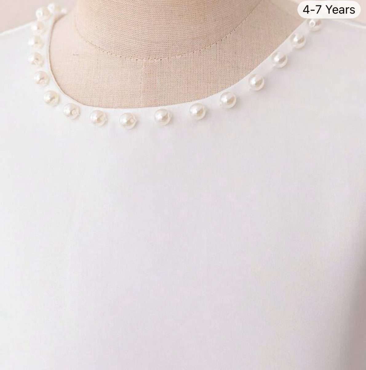 Vestido blanco con perlas