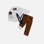 Camisa blanca estampada con coderas café y humita, junto al pantalón de cotelé café con suspensores azules