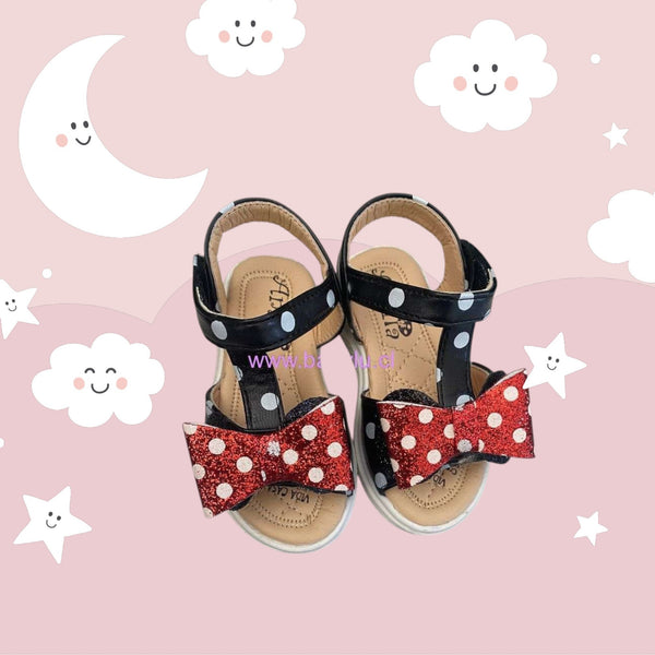Sandalias Baby Lu negras con lunares blancos y lazo rojo brillante de Minnie Mouse para niña