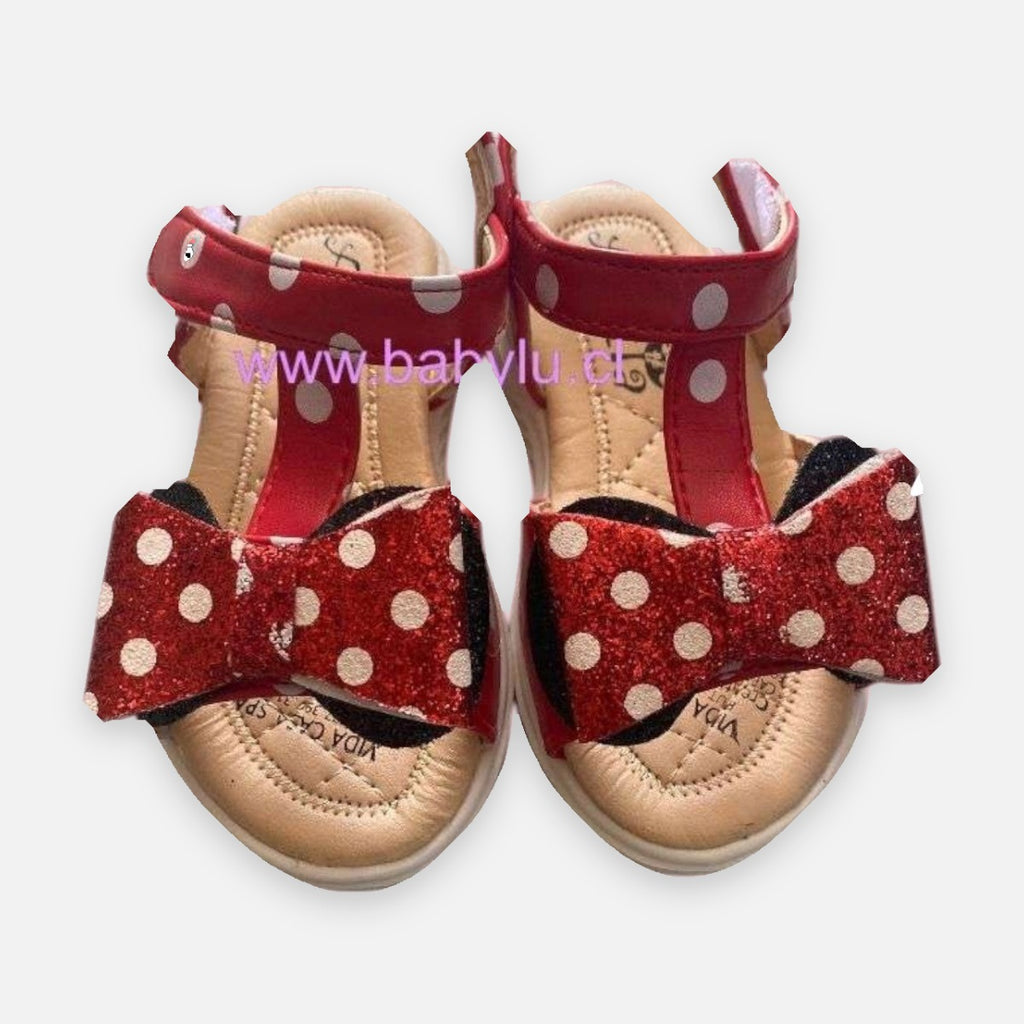 Sandalias Baby Lu rojas de Minnie Mouse para niña con lazo brillante de lunares y cierre de velcro ajustable
