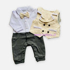 Las dos piezas por separado: enterito con camisa y humita, y la chaqueta crema sin mangas